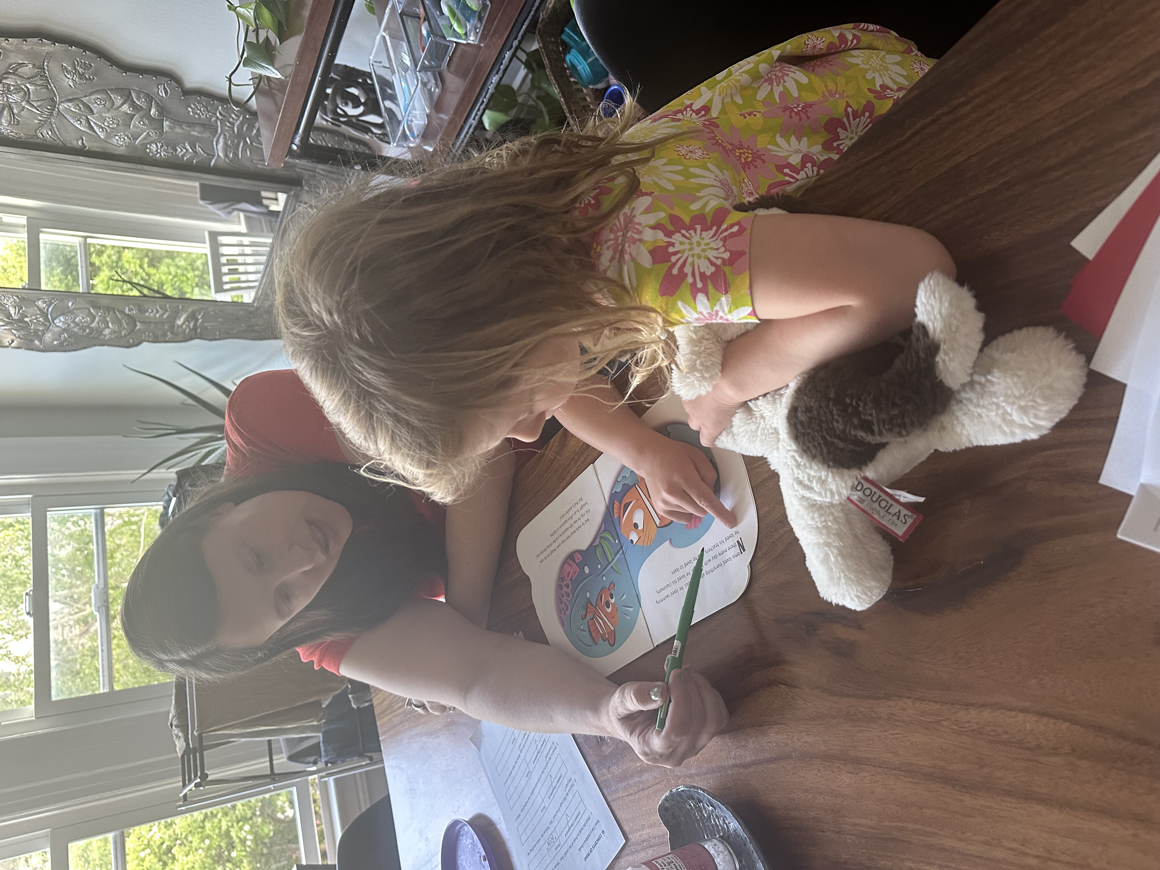 Kaitlyn reading with a child